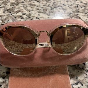 Miu Miu Round 49 mm sunglasses